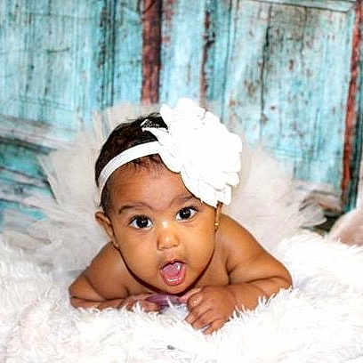 Bostyn is registered to the contest to win money with this photo: baby, child, fashion_accessory, fur, hair_accessory, headband, headgear, headpiece, headwear, person, photograph, photography, skin, smile, surprise, toddler