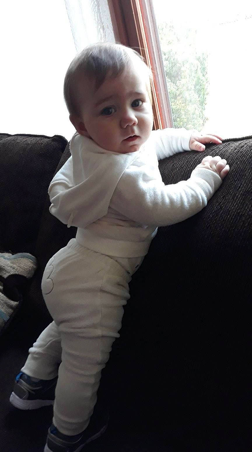 Onyx is registered to the contest to win money with this photo: arm, boy, child, day, eye, fun, girl, hand, infant, joint, neck, person, product, shoulder, sitting, skin, smile, standing, textile, toddler