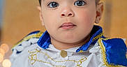 Haisbran joined the competition — help win amazing prizes! child, toddler, portrait, costume, prince, blue, gold, white_shirt, face, eyes, curly_hair, young_child, cute, fashion, indoor, closeup, expressionless, baby, person, sitting