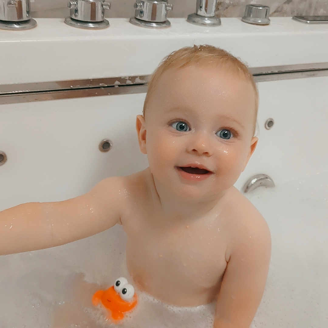 Killian joined the competition — help win amazing prizes! baby, bath, bathtub, bubbles, child, cute, faucet, fun, happy, kid, orange_toy, person, play, portrait, smile, toy, tub, water, wet, young