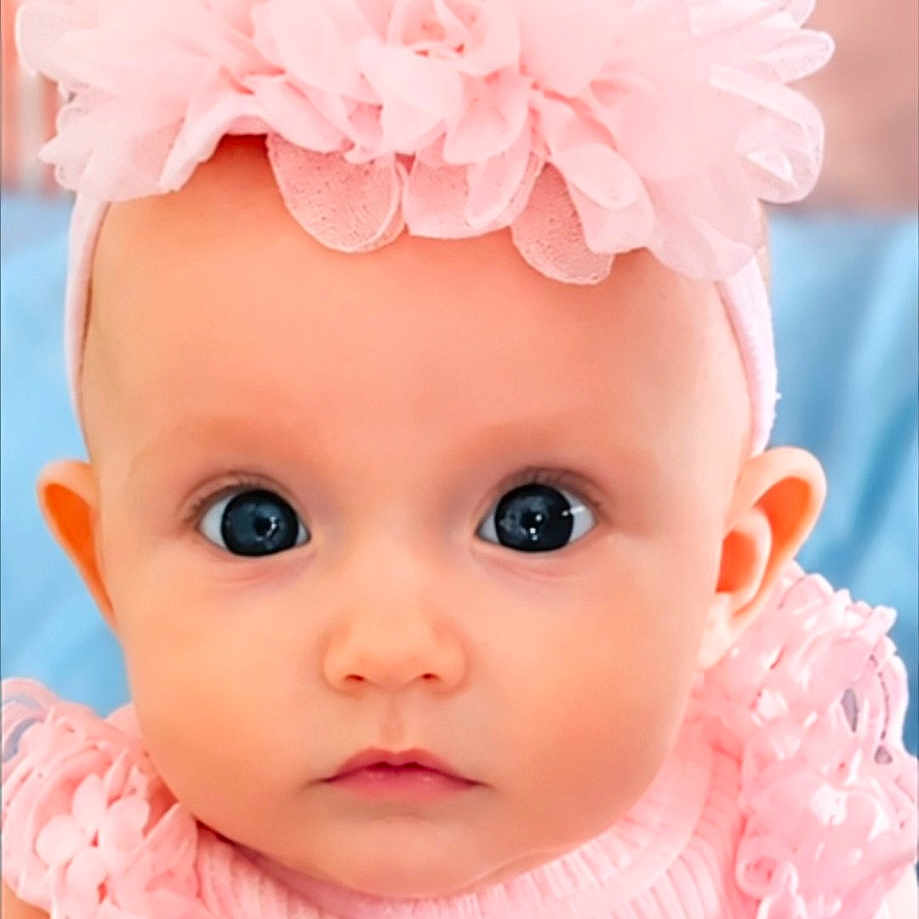 Danaerys joined the competition — help win amazing prizes! baby, infant, child, pink, headband, flower, dress, cute, portrait, wide_eyes, frills, soft_background, indoor, young_child, adorable, face, person, fashion, closeup, skin