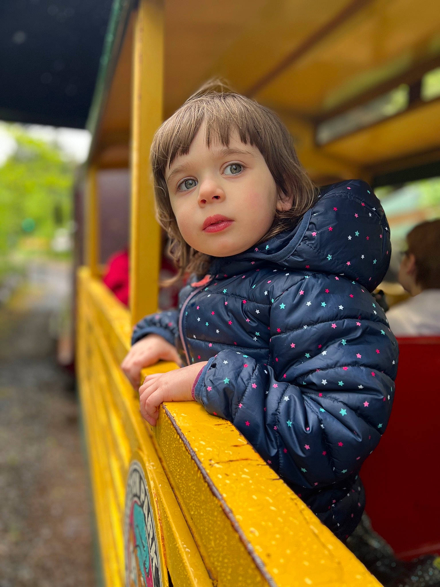 Rayna is registered to the contest to win money with this photo: child, city, electric_blue, fun, happy, human_settlement, jacket, leisure, magenta, person, play, portrait_photography, public_space, recreation, sitting, skin, toddler, travel, vacation, winter