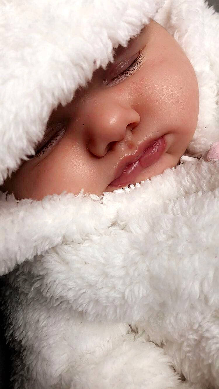 Lainey is registered to the contest to win money with this photo: baby, beauty, cheek, child, chin, close_up, eye, face, facial_expression, fur, fur_clothing, happy, head, headwear, lip, mouth, nose, person, skin, smile