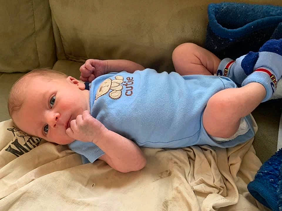 Mellie is registered to the contest to win money with this photo: baby, baby_sleeping, baby_toddler_clothing, cheek, child, clothing, comfort, facial_expression, grass, hand, headgear, human, human_body, mammal, mouth, person, product, skin, textile, toddler