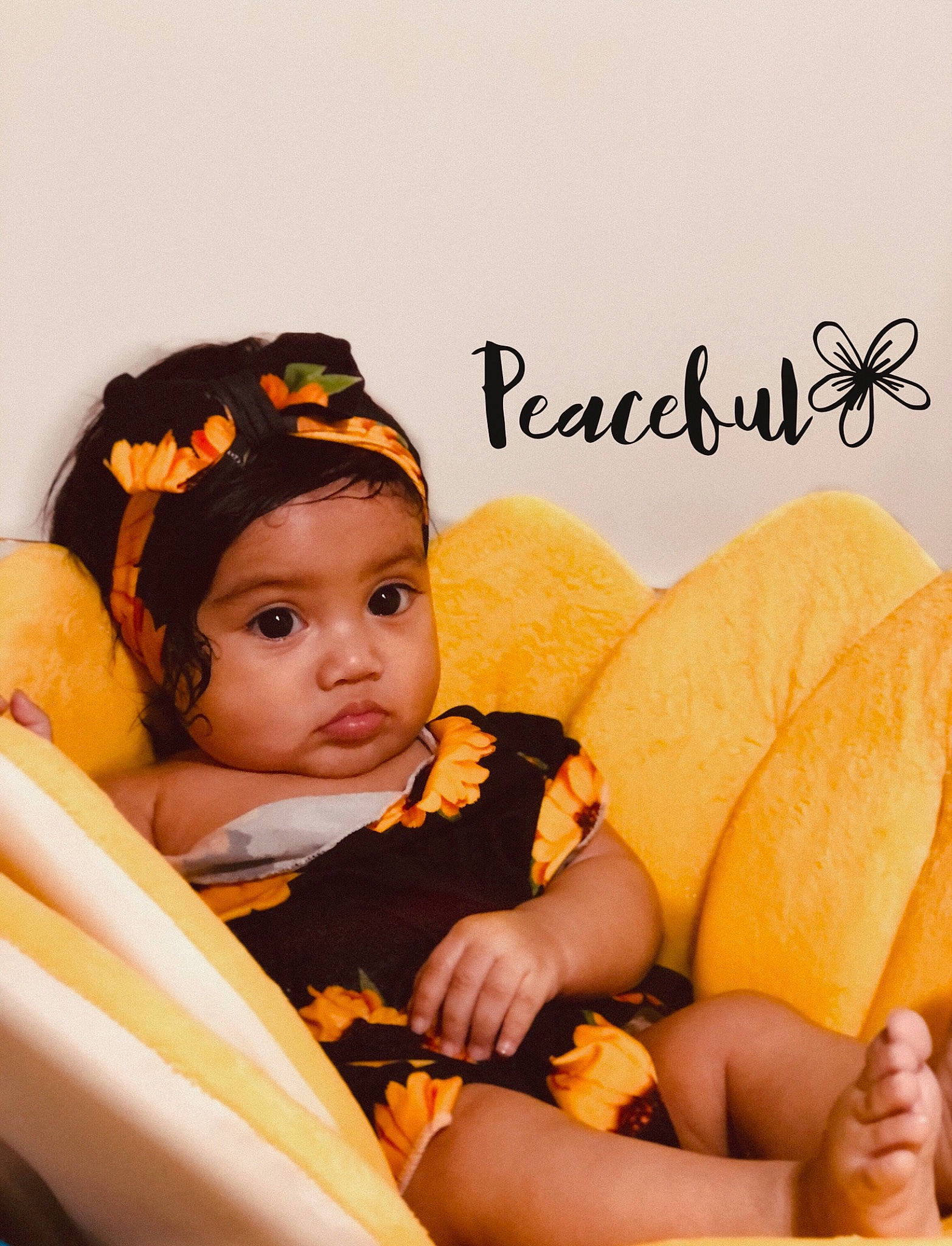 Aliyanna is registered to the contest to win money with this photo: baby, baby_toddler_clothing, bread, child_model, comfort, hair_accessory, hand, headband, headpiece, headwear, nail, orange, peach, person, potato_chip, snack, sweetness, toddler, yellow