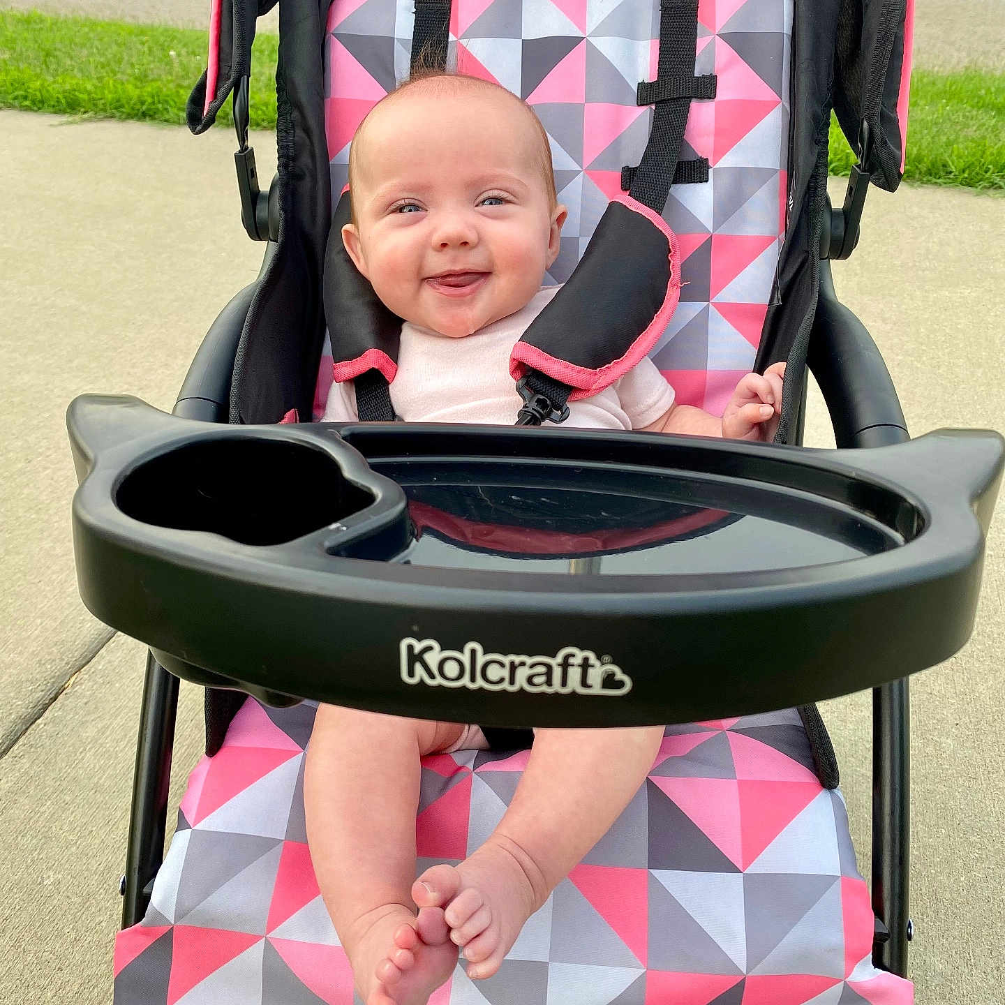 Sayler is registered to the contest to win money with this photo: accessories, baby, city, clothing, face, glove, grass, head, nature, outdoors, park, person, photography, plant, portrait, road, street, summer, sunglasses, urban
