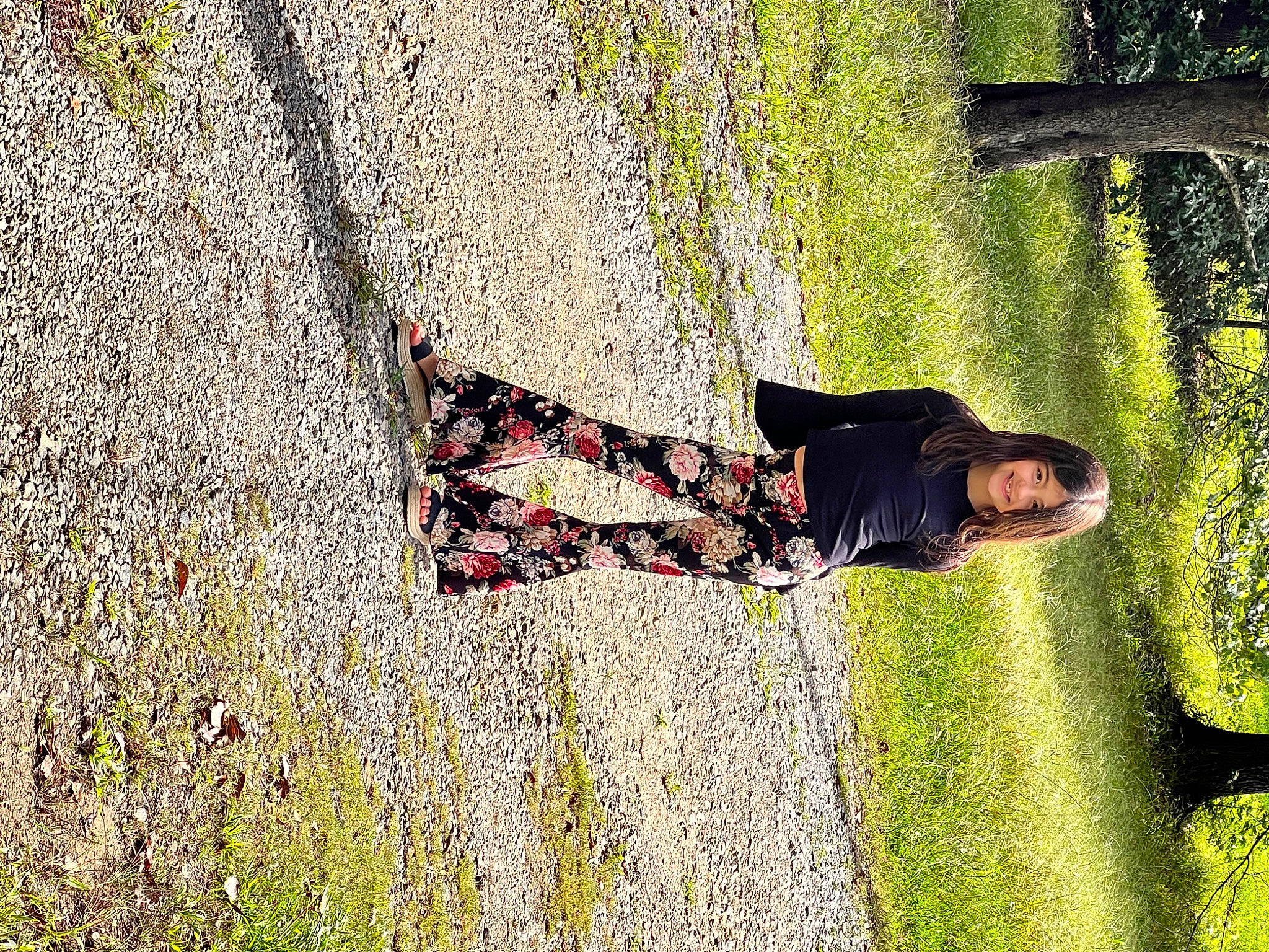 Madeline is registered to the contest to win money with this photo: forest, fun, grass, grass_family, happy, joy, landscape, leisure, pattern, people_in_nature, person, plant, shadow, sitting, smile, soil, tints_and_shades, tree, trunk, visual_arts