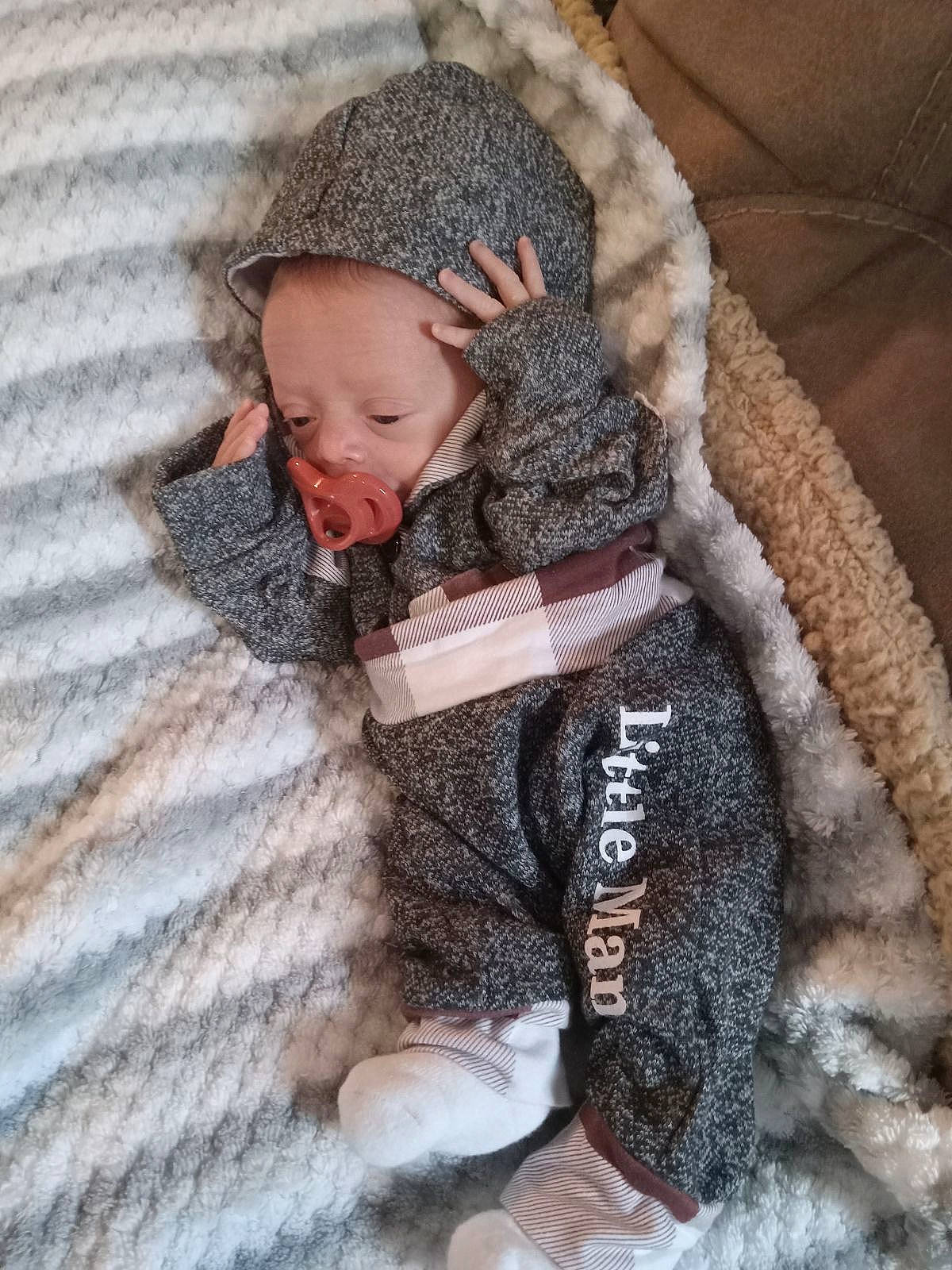 Legend joined the competition — help win amazing prizes! baby, baby_toddler_clothing, beanie, cap, child, comfort, fashion_accessory, freezing, fur, fur_clothing, knit_cap, knitting, linens, pattern, person, sitting, sleeve, toddler, winter, wool