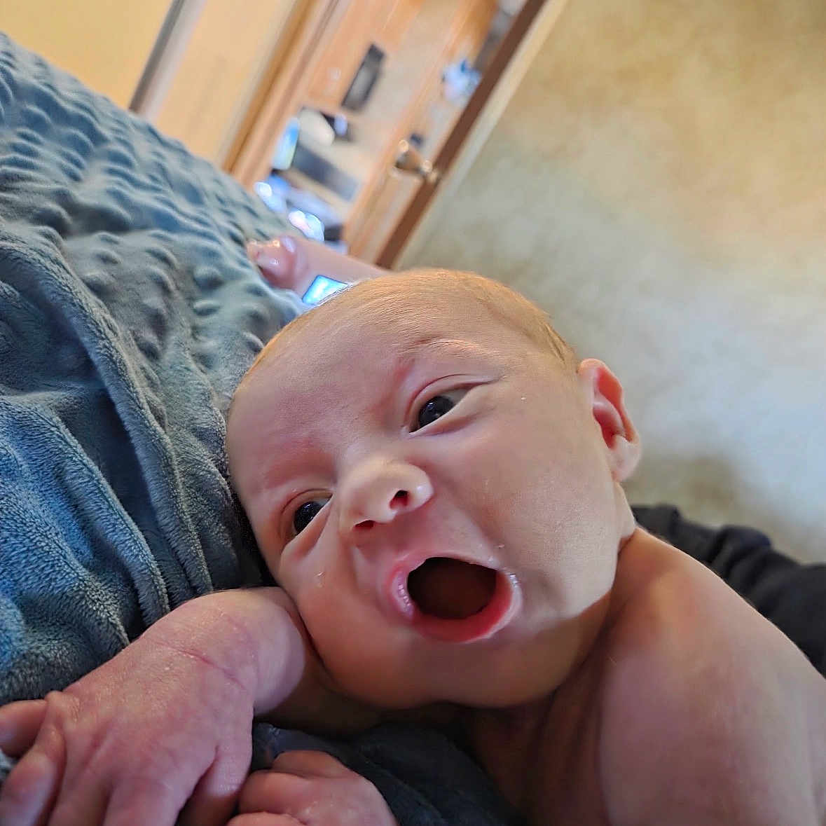 Rick joined the competition — help win amazing prizes! baby, blanket, child, close_up, cozy, cute, expression, face, hand, human, indoor, infant, mouth_open, newborn, newborn_baby, portrait, resting, skin, small, soft_texture