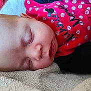 Lyana a rejoint le concours — aidez-le/la à gagner de superbes lots ! baby, child, close_up, cozy, cute, eyelashes, face, head, infant, mickey_mouse, nap, peaceful, polka_dots, portrait, red_clothing, rest, skin, sleeping, soft_texture, towel