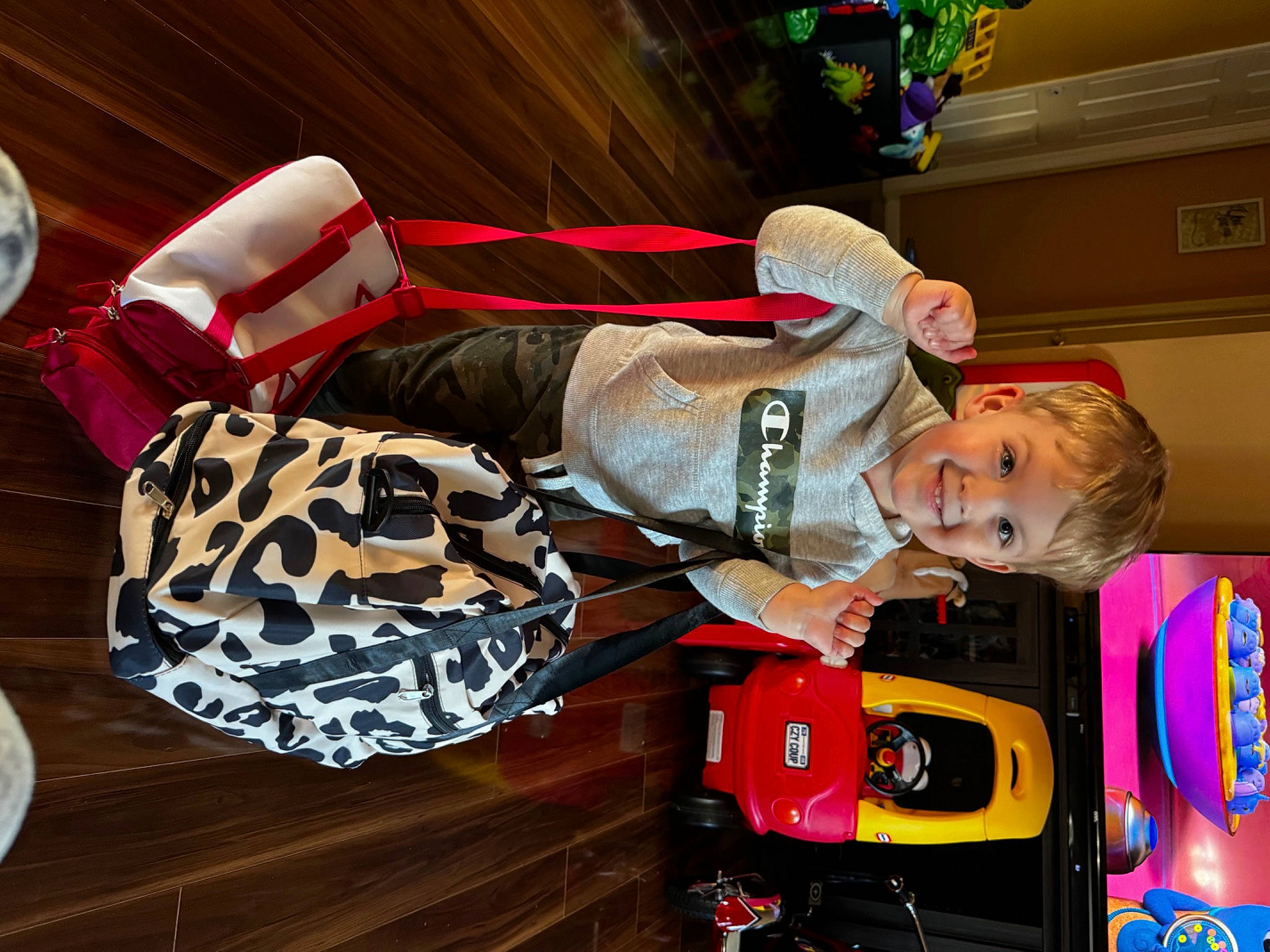 Logan joined the competition — help win amazing prizes! bag, child, comfort, event, fashion_accessory, fun, happy, holiday, human_leg, joy, leisure, pattern, person, room, smile, toddler, wood