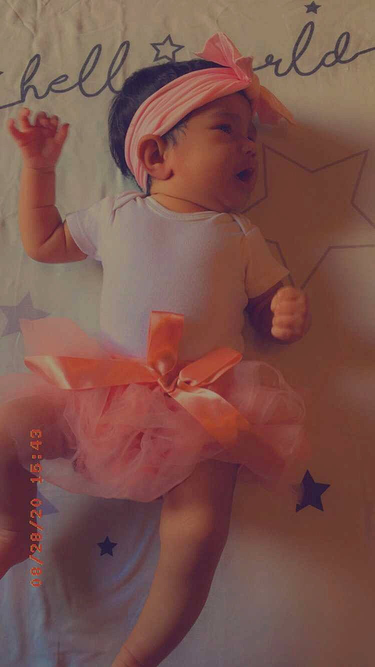 Kaelani is registered to the contest to win money with this photo: art, baby, ballet_tutu, child, costume, flesh, headwear, peach, person, pink, toddler