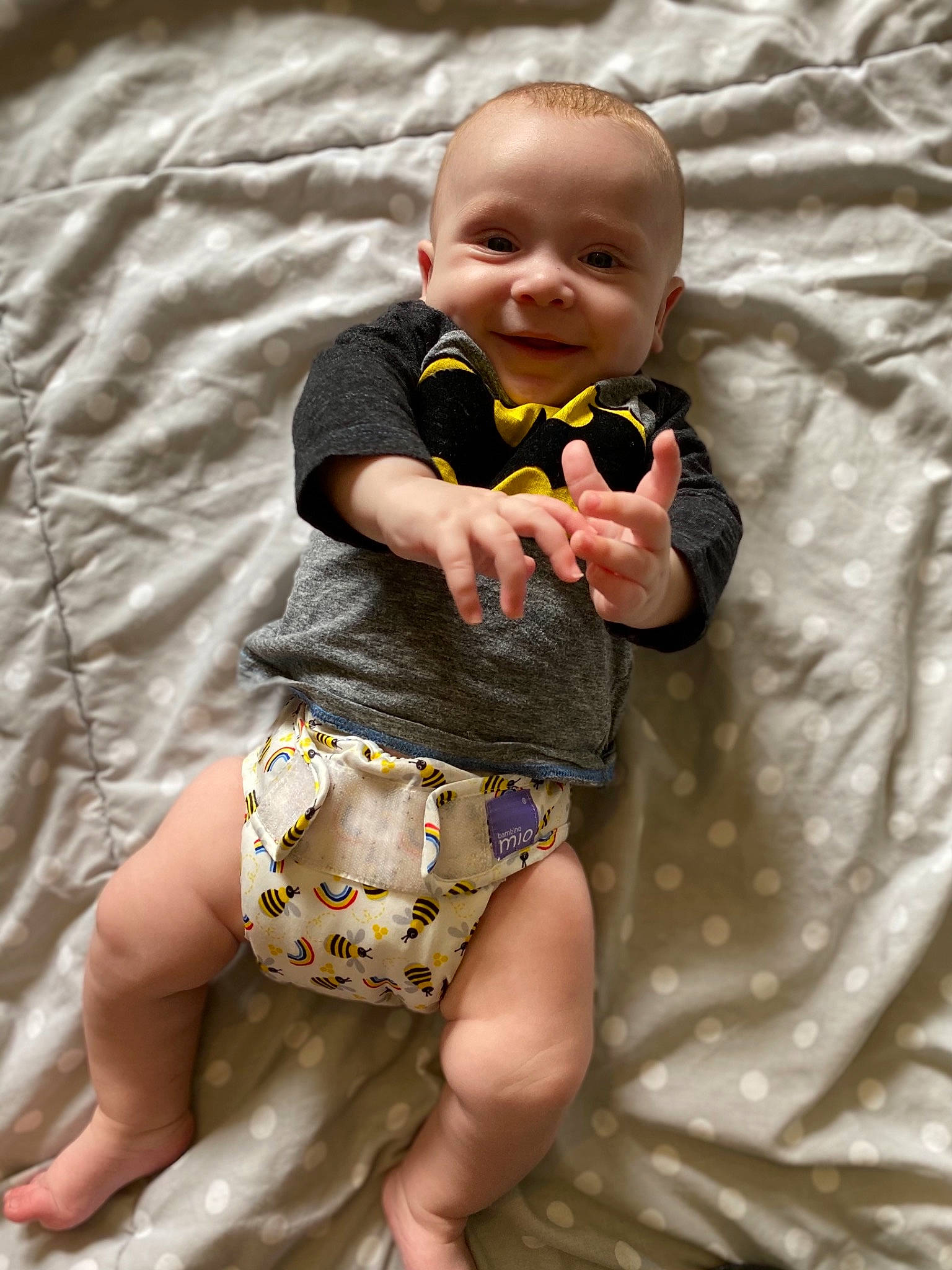 Bowie is registered to the contest to win money with this photo: baby, baby_toddler_clothing, child, eye, finger, happy, head, human_body, iris, joint, joy, leg, mouth, people, person, photograph, skin, sleeve, smile, textile