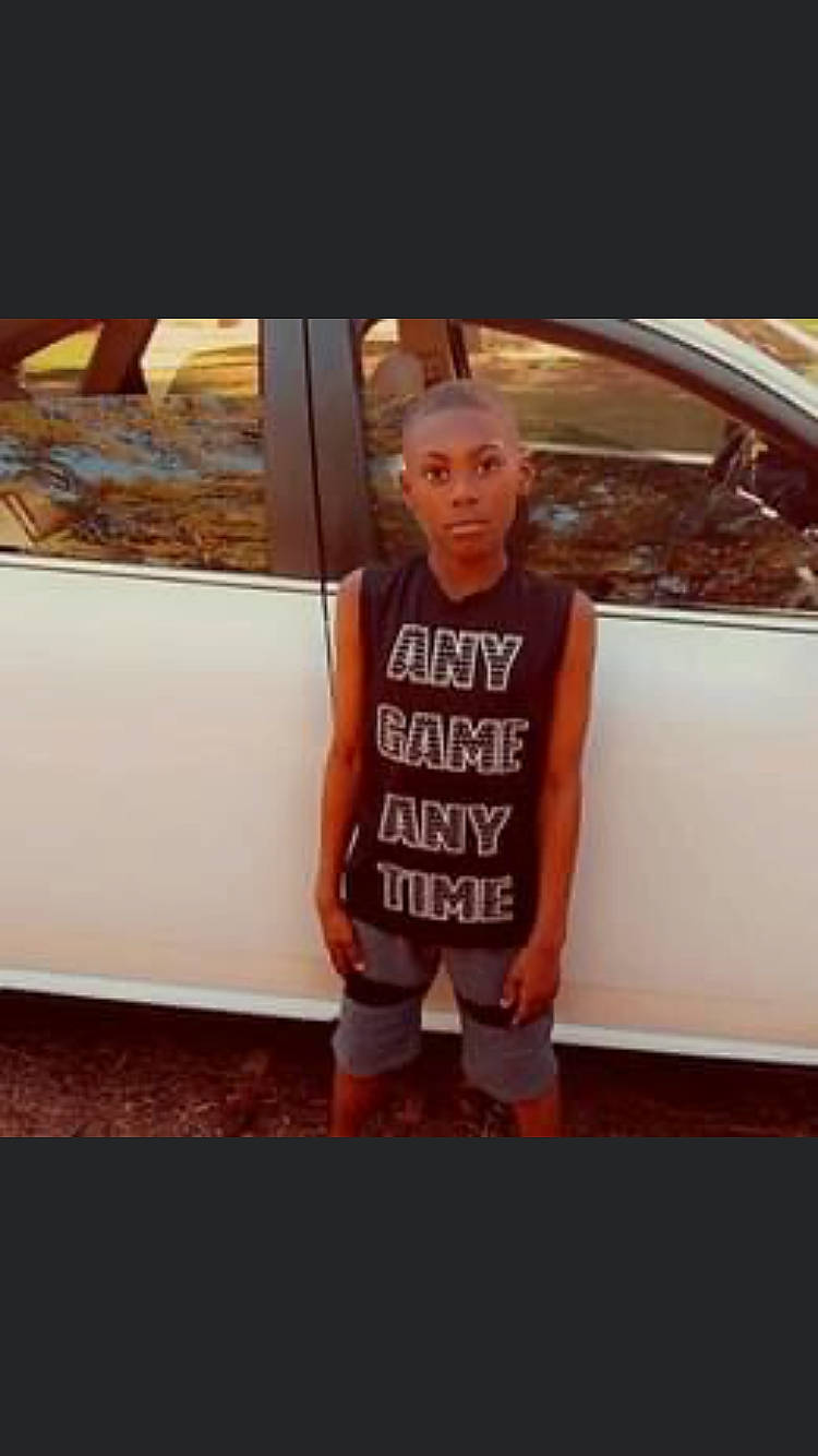 Braylen is registered to the contest to win money with this photo: auto_part, automotive_design, automotive_exterior, automotive_lighting, bumper, car, family_car, luxury_vehicle, motor_vehicle, orange, person, personal_luxury_car, shorts, sleeve, sportswear, t_shirt, tints_and_shades, toddler, trunk, vehicle