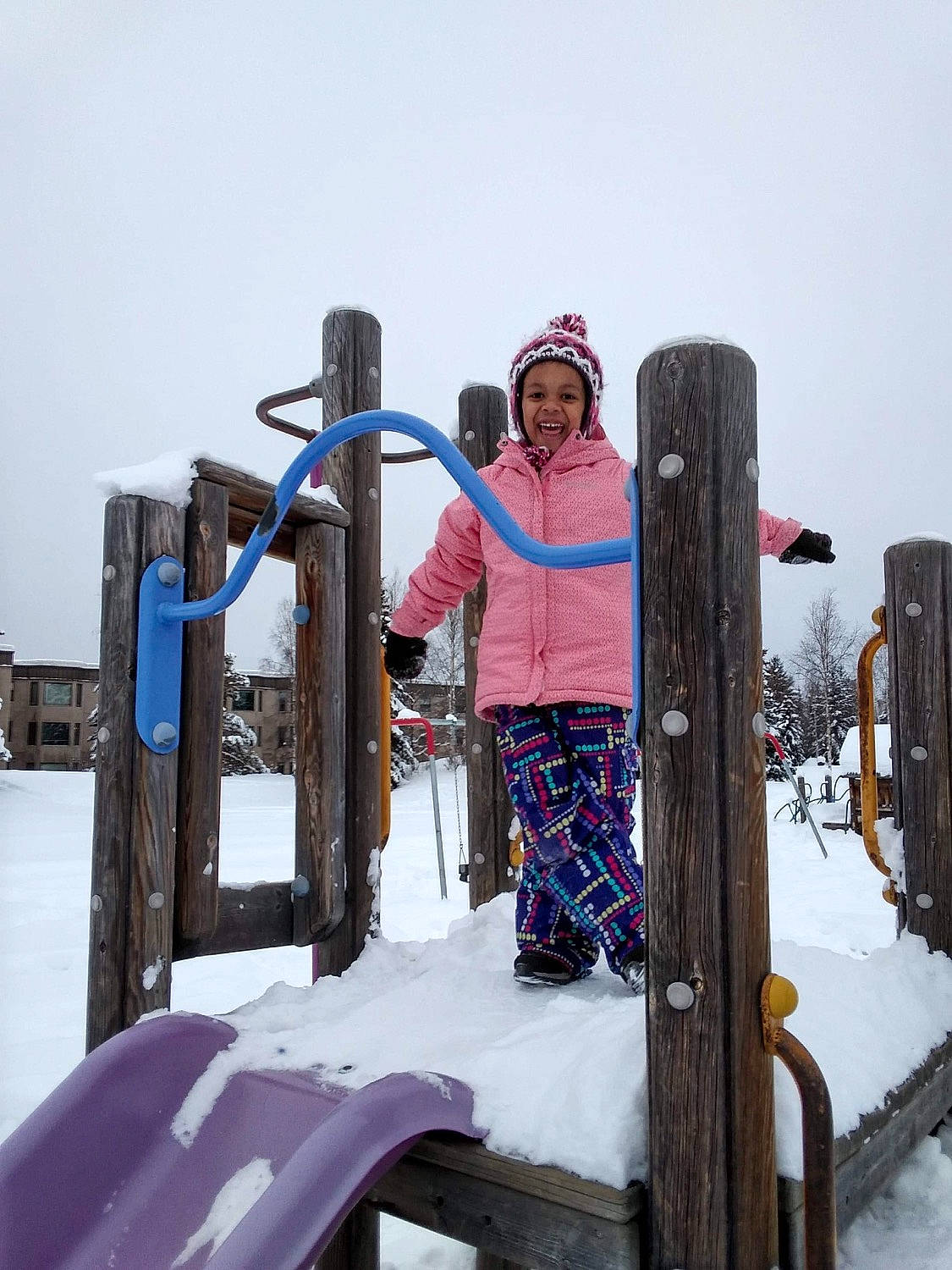 Kayonna joined the competition — help win amazing prizes! chute, city, freezing, fun, hat, headgear, headwear, helmet, ice_cap, joy, leisure, magenta, person, precipitation, recreation, skiing, sky, slope, smile, snow