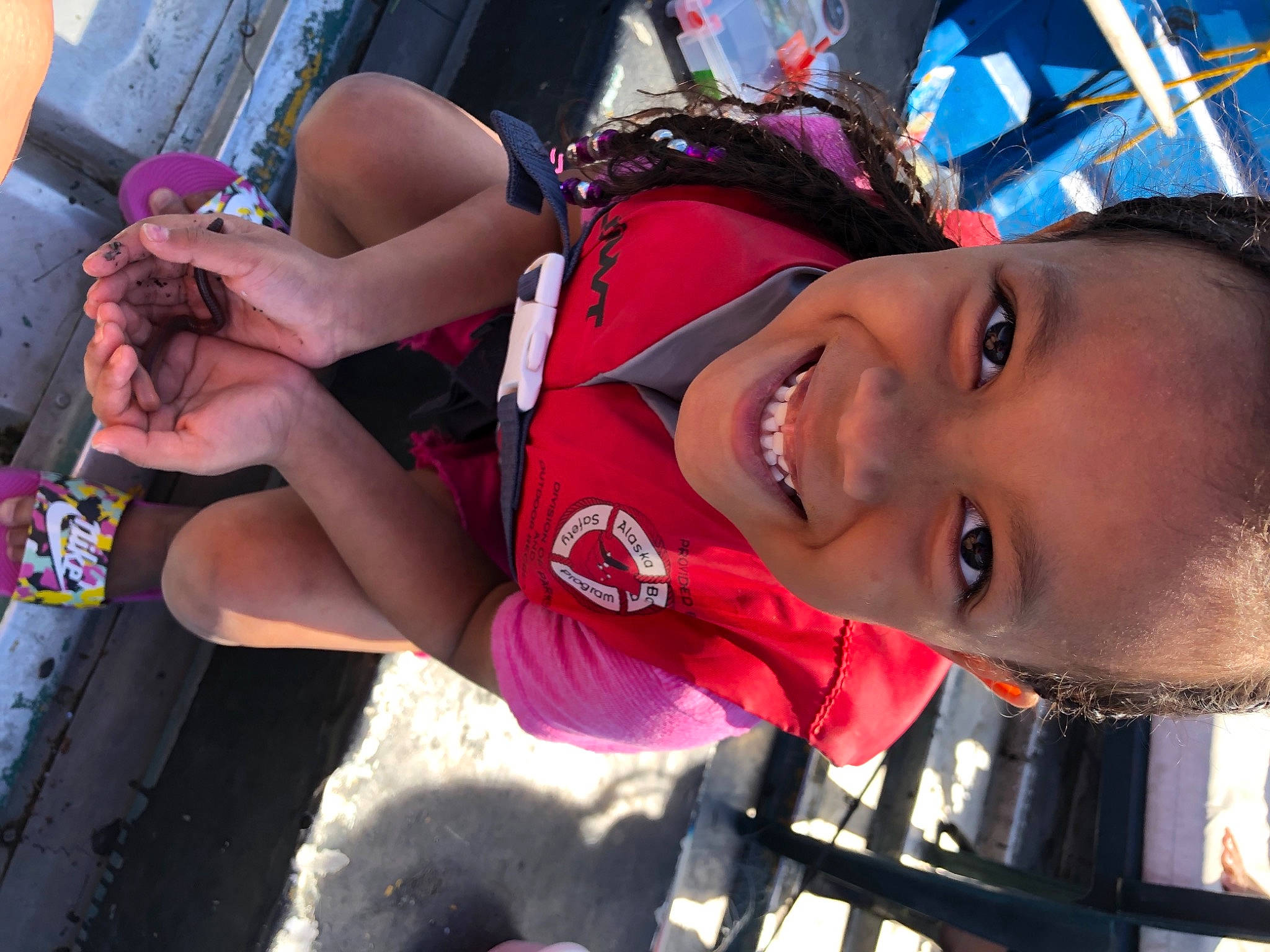 Kayonna is registered to the contest to win money with this photo: beauty, black_hair, cool, electric_blue, eyewear, fun, happy, hat, headgear, human_leg, joy, leisure, mouth, person, pink, public_space, recreation, smile, thigh, toddler