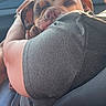 Gus Gus is registered to the contest to win money with this photo: bulldog, dog, puppy, sleeping, sleepy, wrinkled_face, pet, animal, cuddling, human, arms, car, vehicle, car_interior, passenger_seat, road_trip, sunlight, close_up, portrait, adorable