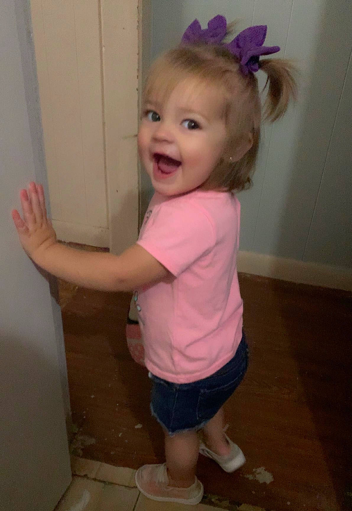 Nataleigh is registered to the contest to win money with this photo: baby_toddler_clothing, blond, cheek, child, eye, fashion_accessory, flooring, fun, happy, headband, headpiece, human_leg, iris, leg, person, pink, shorts, sleeve, smile, thumb