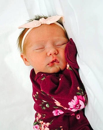 Kinzley joined the competition — help win amazing prizes! baby, baby_toddler_clothing, cheek, child, chin, comfort, dress, eye, eyebrow, face, fashion_accessory, headgear, iris, lip, magenta, neck, outerwear, person, pink, sleeve