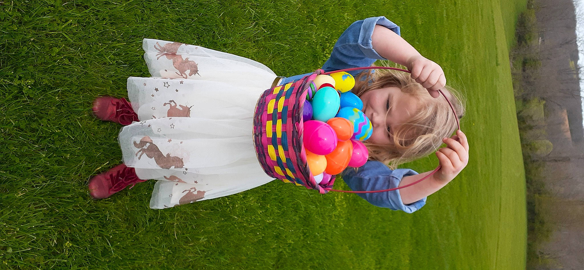 Alayna is registered to the contest to win money with this photo: baby, baby_products, baby_toddler_clothing, balloon, child, event, fun, grass, grassland, happy, lawn, leisure, party_supply, pattern, people_in_nature, person, pink, recreation, sitting, toddler