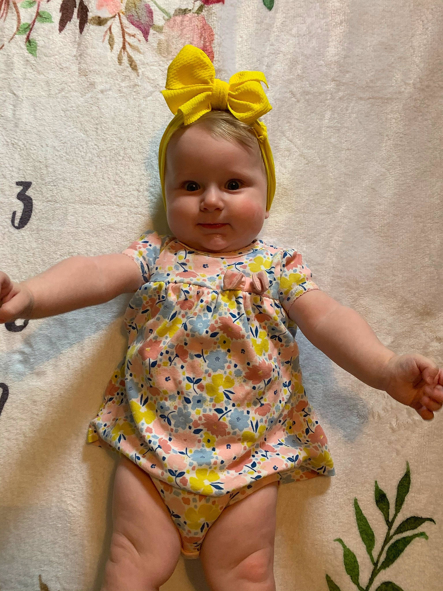 Zaya is registered to the contest to win money with this photo: baby_toddler_clothing, dress, eye, facial_expression, fawn, finger, fun, hairstyle, happy, human, joint, leg, organ, people_in_nature, person, pink, plant, skin, textile, thigh