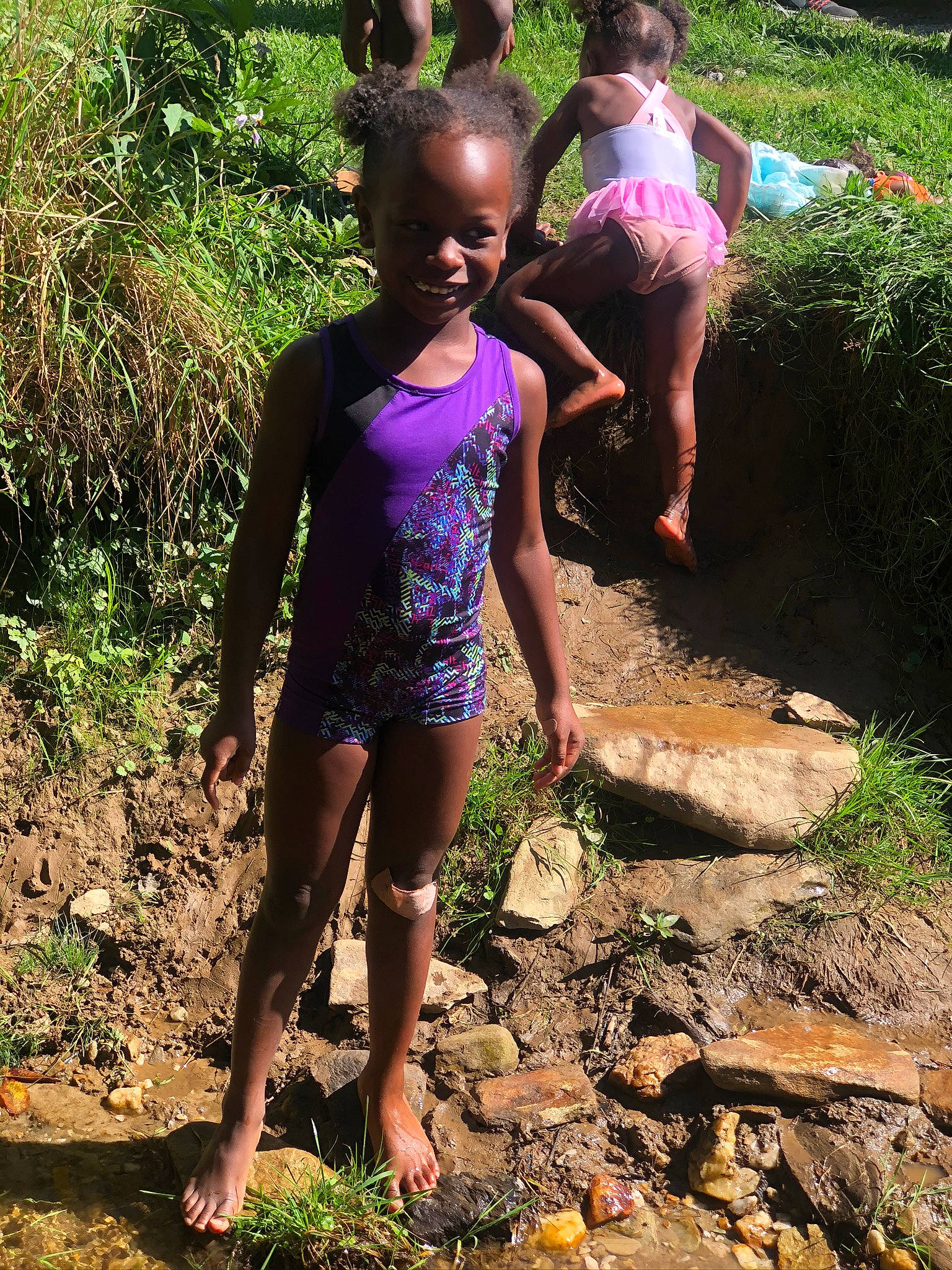 Khaleaya is registered to the contest to win money with this photo: barefoot, foot, human_body, joy, people_in_nature, person, purple, summer, swimwear, toe