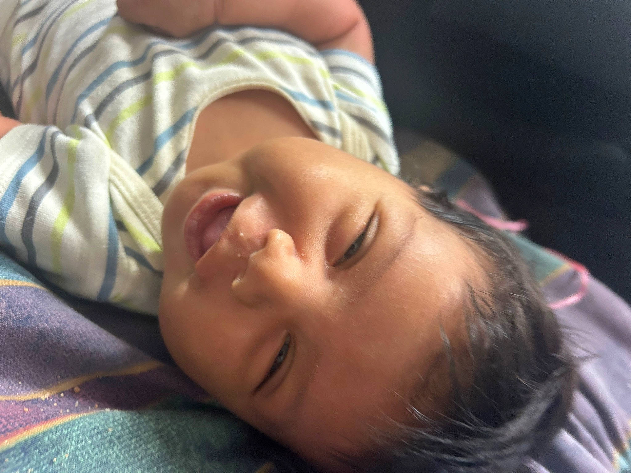 Alfredo is registered to the contest to win money with this photo: baby, baby_toddler_clothing, cheek, chest, child, comfort, ear, eyelash, fun, grass, happy, iris, lip, mouth, nap, nose, person, portrait_photography, skin, smile