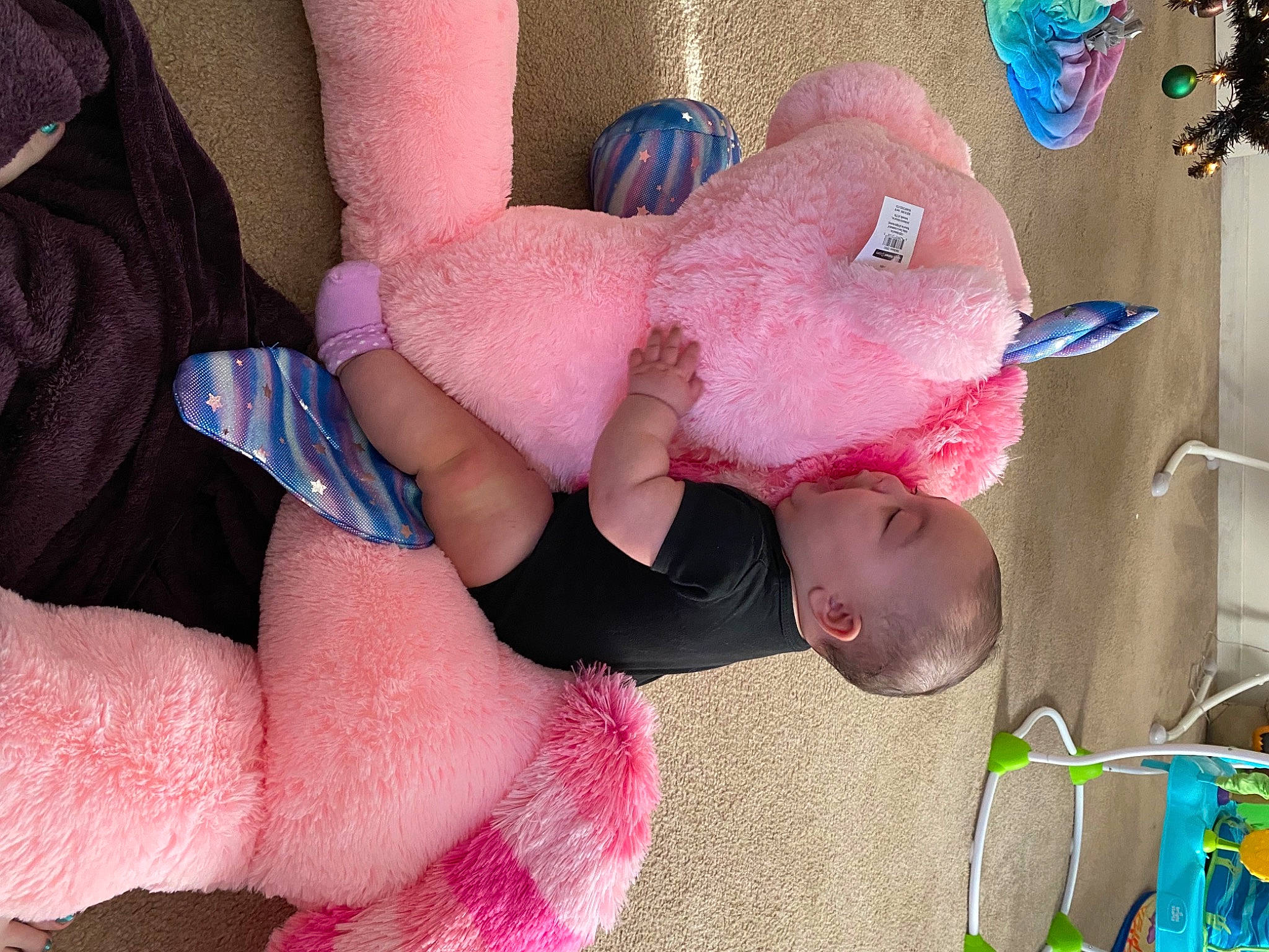Darcy joined the competition — help win amazing prizes! baby, baby_products, baby_toddler_clothing, child, comfort, finger, foot, human_body, human_leg, linens, magenta, person, pink, play, purple, room, skin, teddy_bear, textile, thigh