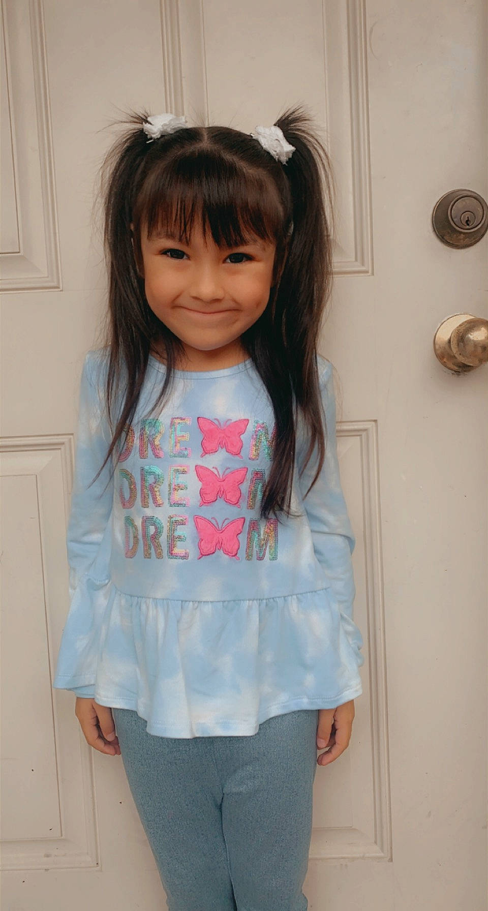 Lena is registered to the contest to win money with this photo: clothing, cool, eyelash, face, facial_expression, hair, hairstyle, happy, head, iris, joy, neck, outerwear, person, shoulder, skin, sleeve, smile, street_fashion, t_shirt