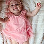 Milani joined the competition — help win amazing prizes! baby, child, infant, pink_dress, headband, bow, blanket, soft_texture, lying_down, cute, smiling, happy, skin, face, arms, legs, indoors, portrait, young, person