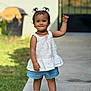 Basma joined the competition — help win amazing prizes! baby, casual_clothing, child, cute, daylight, grass, happy, jewelry, necklace, outdoor, person, pigtails, shorts, sidewalk, smiling, sneakers, standing, toddler, top, young