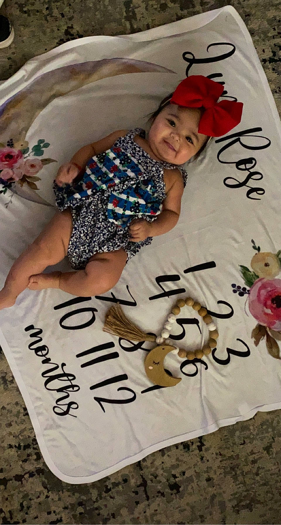 Luna is registered to the contest to win money with this photo: baby, baby_toddler_clothing, beauty, child, comfort, event, font, handwriting, happy, headwear, human, linens, mammal, people, person, pink, red, smile, t_shirt, textile