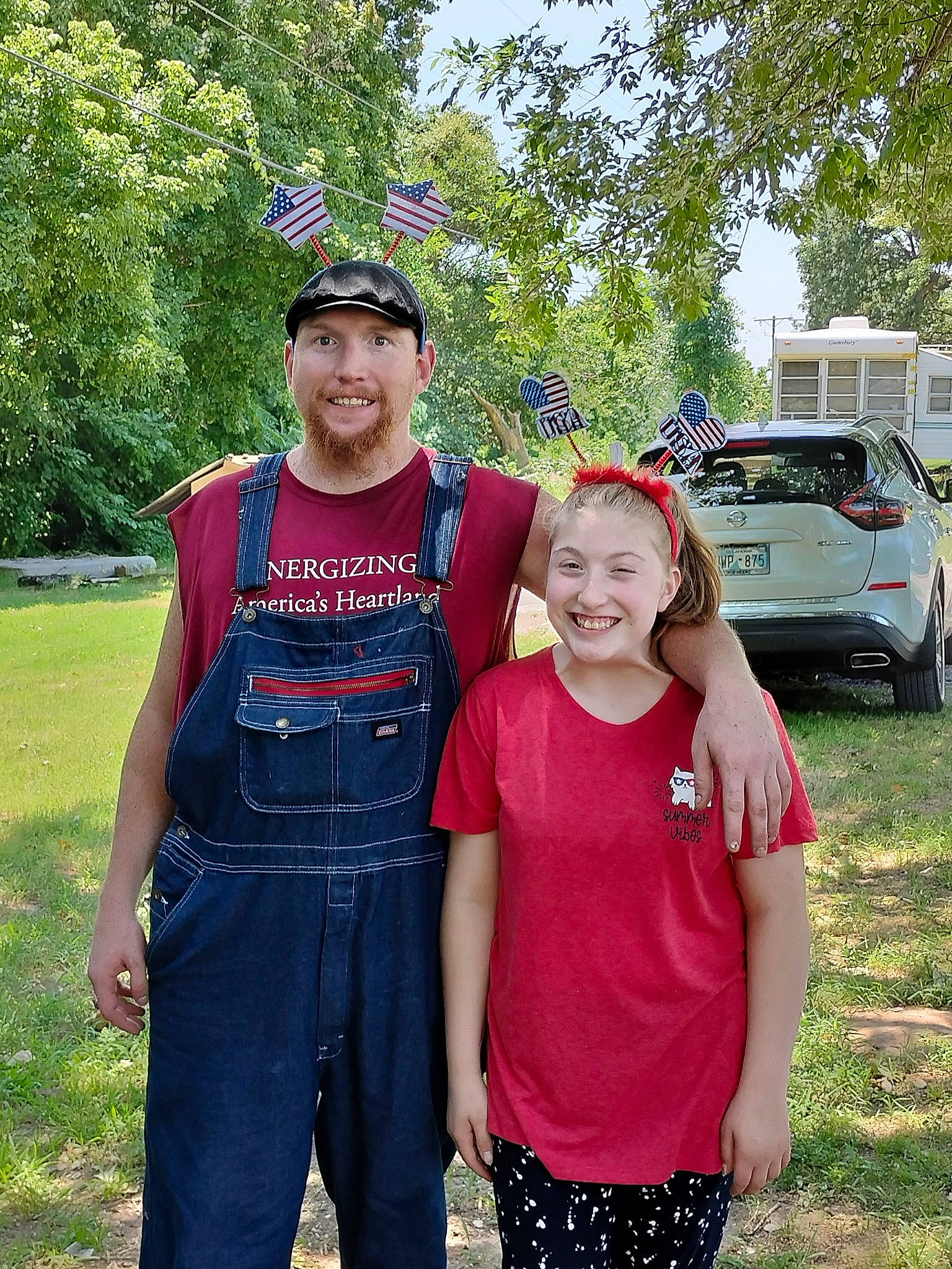 Anna joined the competition — help win amazing prizes! belt, car, event, family_car, fun, grass, happy, headwear, joy, landscape, leisure, motor_vehicle, person, plant, recreation, shorts, smile, t_shirt, tire, tree