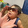 Josiah joined the competition — help win amazing prizes! baby, child, sunglasses, hands, indoor, carpet, toy, blue_shirt, face, person, cute, playful, infant, home, chubby_cheeks, glasses, skin, smile, young_child, casual