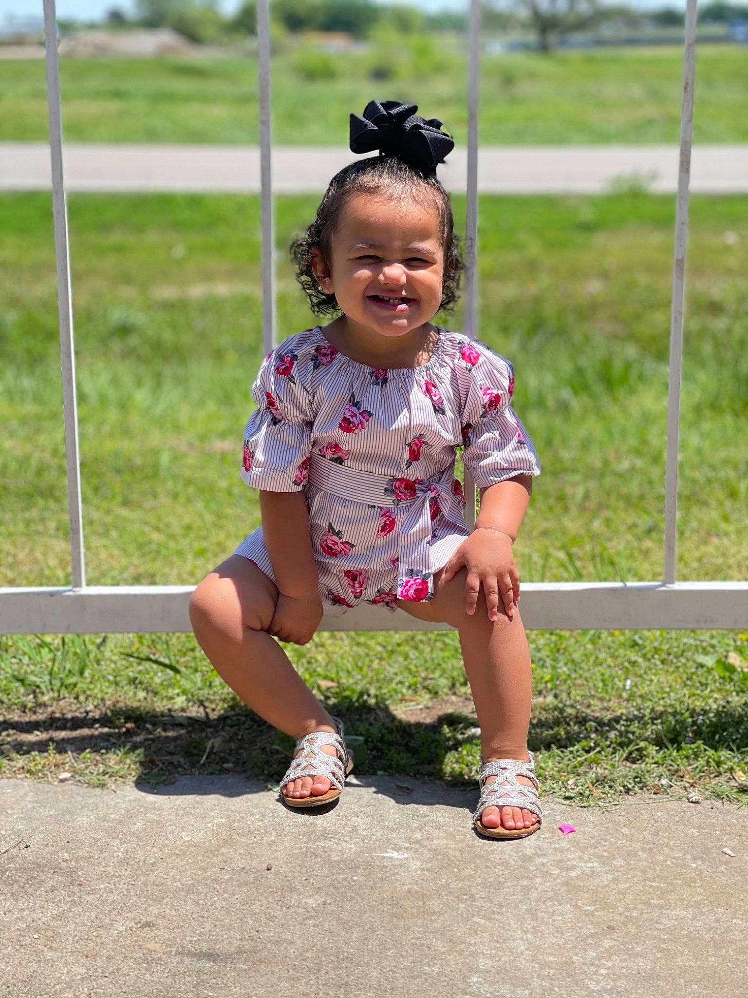 Lillyanna is registered to the contest to win money with this photo: baby_toddler_clothing, child, electric_blue, fashion_accessory, footwear, fun, grass, grassland, happy, hat, human_leg, jewellery, joy, leisure, pattern, person, recreation, sandal, shoe, sneakers