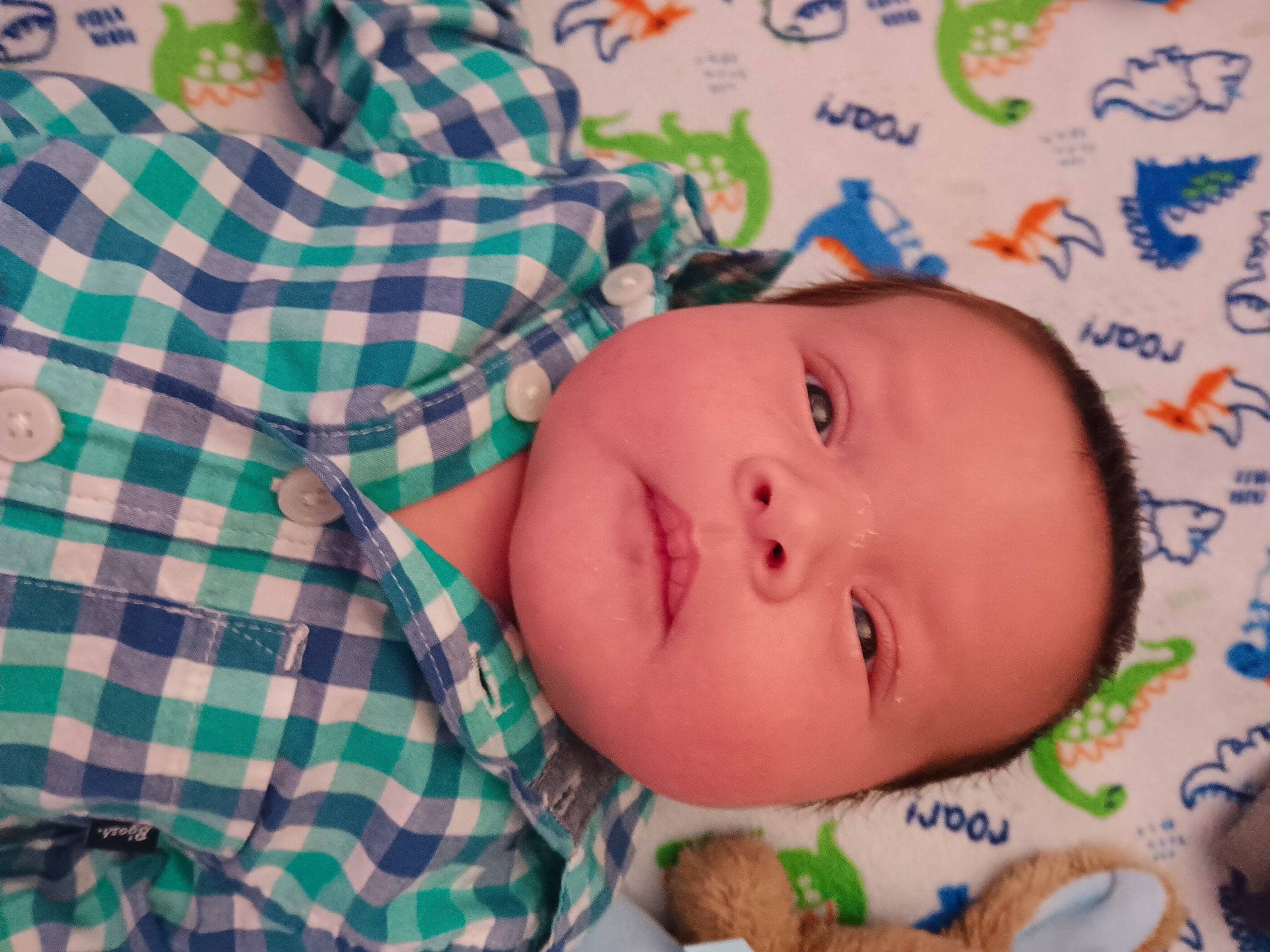 Isiah is registered to the contest to win money with this photo: baby, baby_products, baby_safety, baby_toddler_clothing, bedtime, cheek, child, comfort, eye, happy, linens, nose, pattern, person, plaid, room, skin, sleeve, tartan, textile