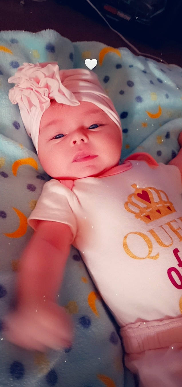 Davina joined the competition — help win amazing prizes! baby, baby_products, baby_sleeping, baby_toddler_clothing, cap, cheek, child, chin, fun, happy, hat, headwear, linens, lip, mouth, nose, person, pink, skin, sleeve