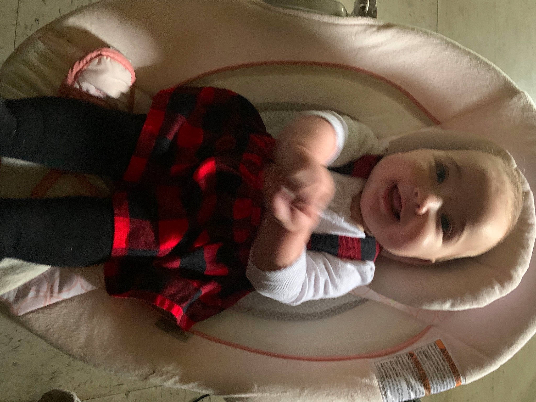 Shelby joined the competition — help win amazing prizes! baby, carmine, circle, comfort, elbow, finger, fun, gesture, human_leg, mammal, mouth, nail, pattern, person, personal_protective_equipment, plaid, room, smile, tartan, toy