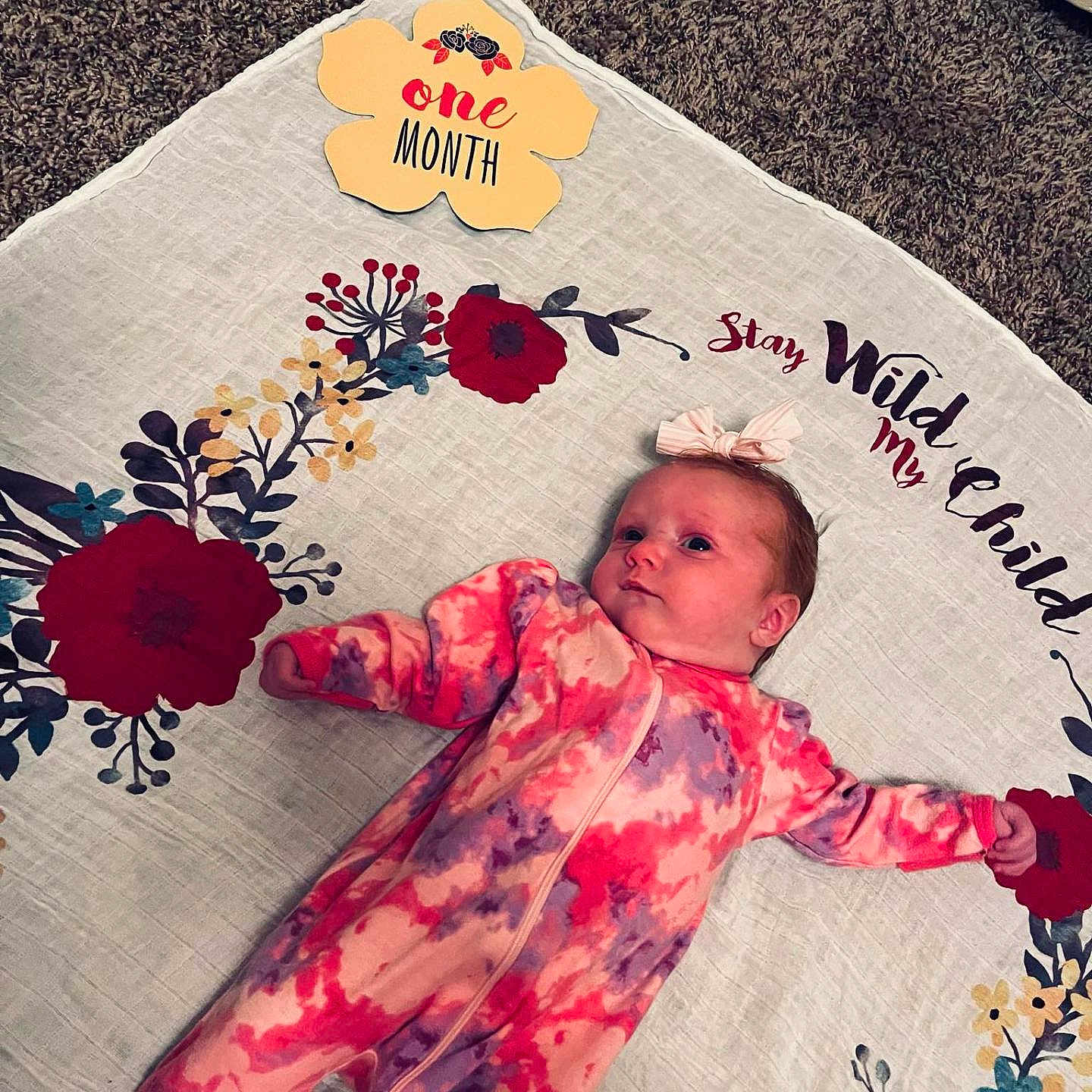Raelynn is registered to the contest to win money with this photo: baby, blanket, clothing, face, flower, furniture, hat, head, homedecor, infantbed, newborn, pajamas, person, petal, photography, plant, portrait, quilt, sleeping, sleeve