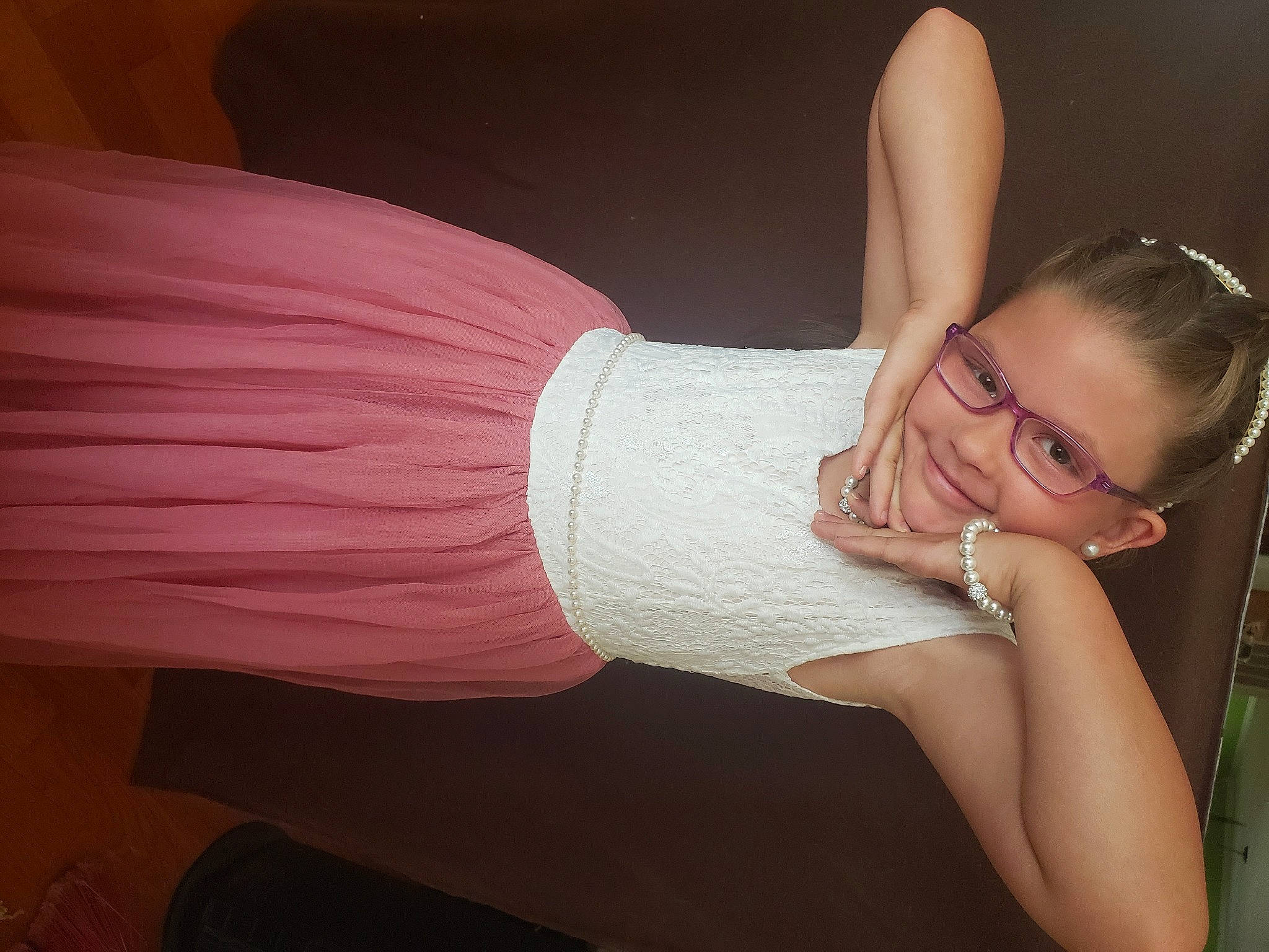 Kailey is registered to the contest to win money with this photo: black_hair, chest, comfort, elbow, eyelash, finger, flash_photography, gesture, glasses, human_body, joint, joy, knee, leg, neck, person, shoulder, sleeve, stomach, thigh