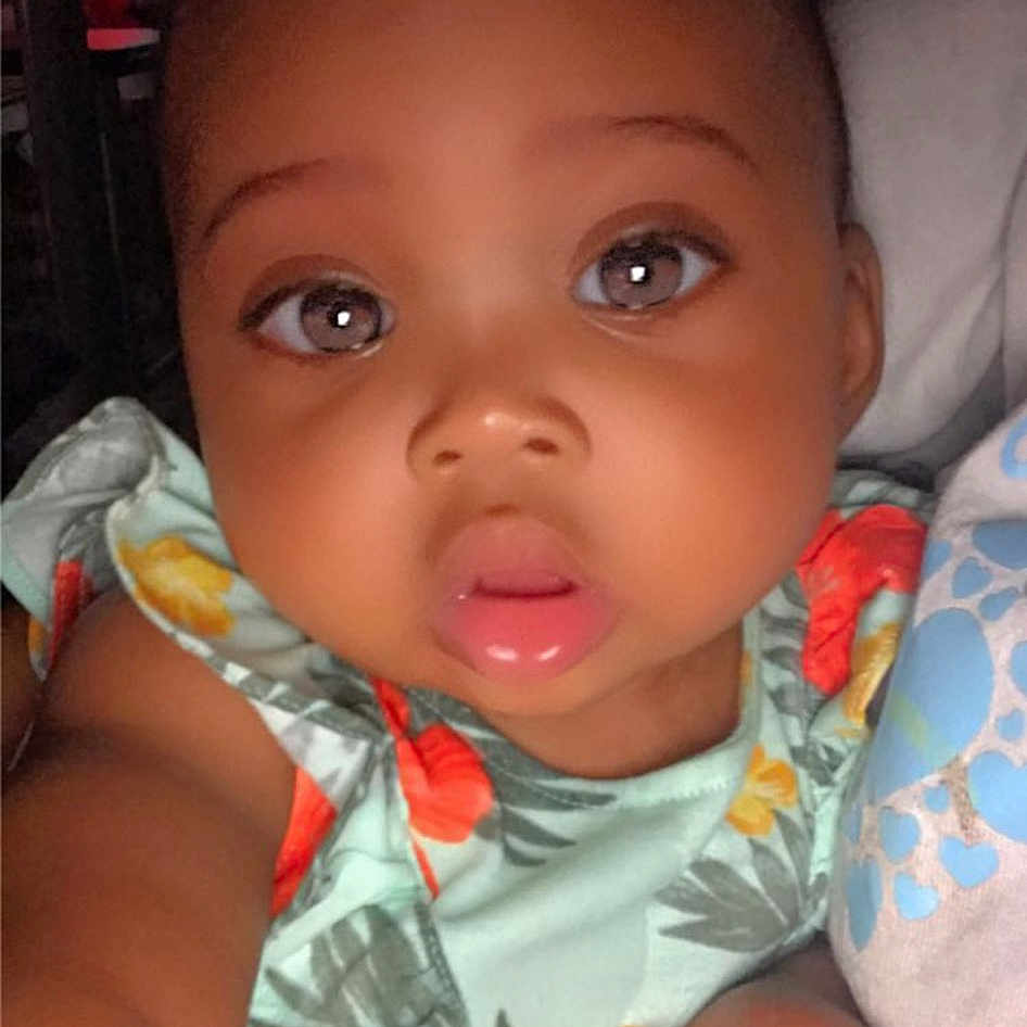 Raina is registered to the contest to win money with this photo: baby, cheek, chin, ear, eyebrow, eyelash, finger, forehead, gesture, hairstyle, hand, happy, iris, lip, mouth, neck, nose, skin, smile, toddler