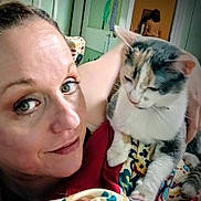 Turbo Cate Calvary joined the competition — help win amazing prizes! woman, cat, face, pet, indoor, blanket, cuddling, closeup, expression, fur, multicolor, person, room, background, home, comfort, relaxed, animal, portrait, colorful