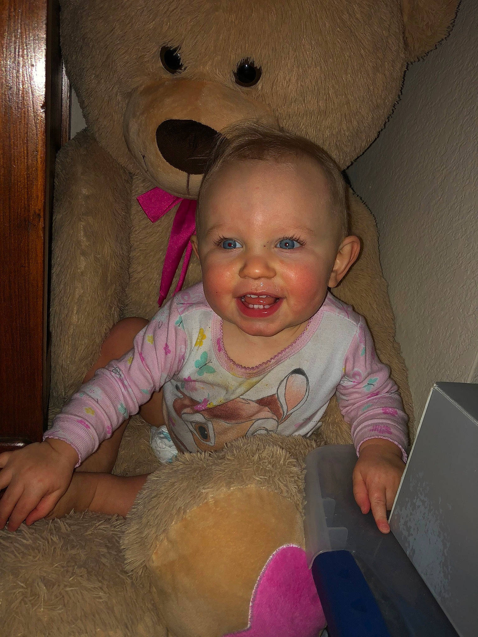 Alison is registered to the contest to win money with this photo: baby, cheek, child, ear, eye, face, fun, head, iris, person, pink, play, plush, sitting, skin, smile, stuffed_toy, teddy_bear, toddler, toy