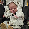 Luca joined the competition — help win amazing prizes! baby, infant, sleeping, blanket, car_seat, clothing, footwear, plush_slippers, cozy, child, cute, resting, indoors, soft_toys, newborn, face, person, wrapped, warm, peaceful