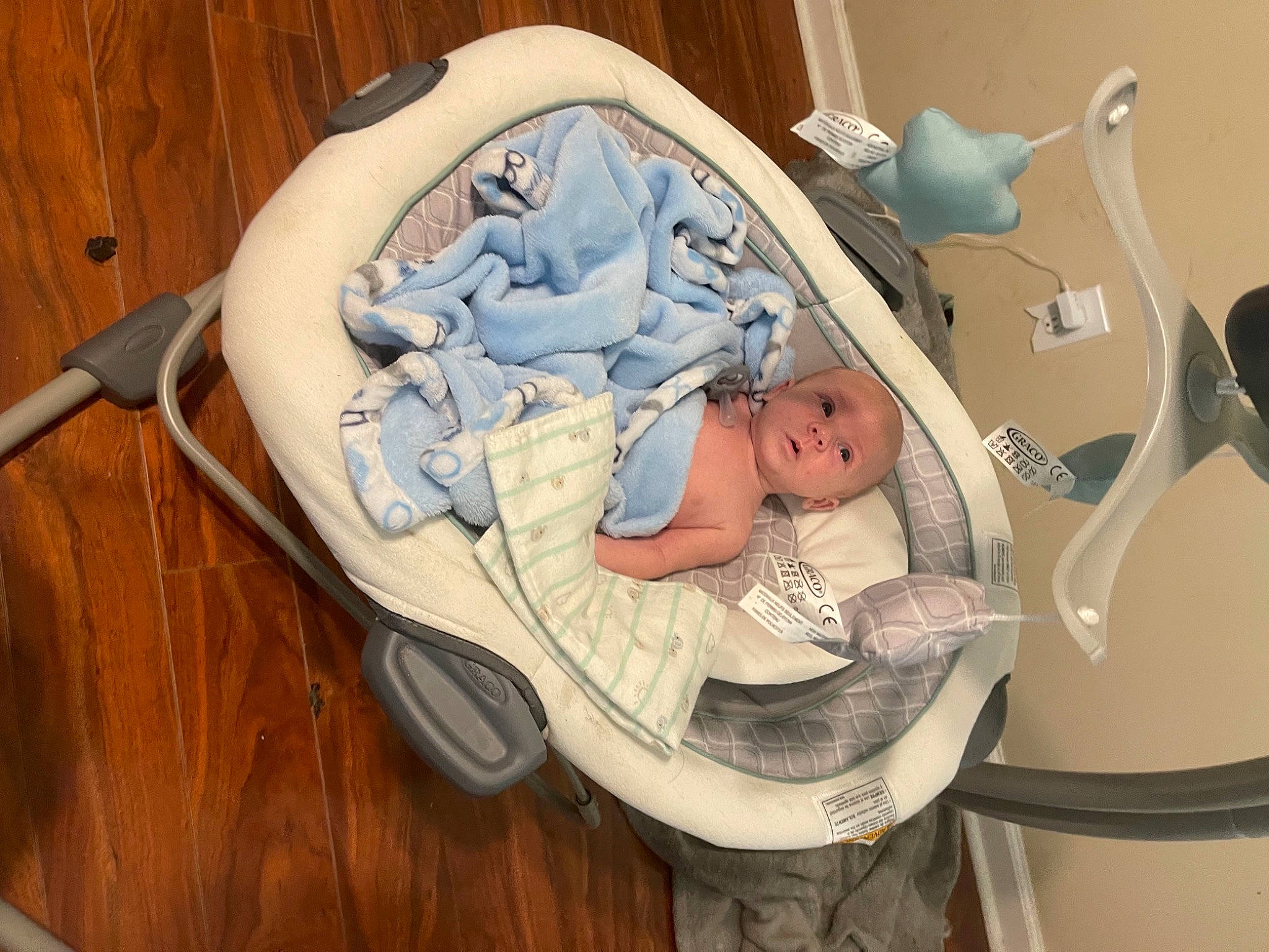 Keanu is registered to the contest to win money with this photo: baby, baby_products, baby_safety, baby_sleeping, baby_toddler_clothing, bedtime, child, comfort, hardwood, hat, health_care, infant_bed, linens, medical, medical_equipment, nap, person, room, service, toddler