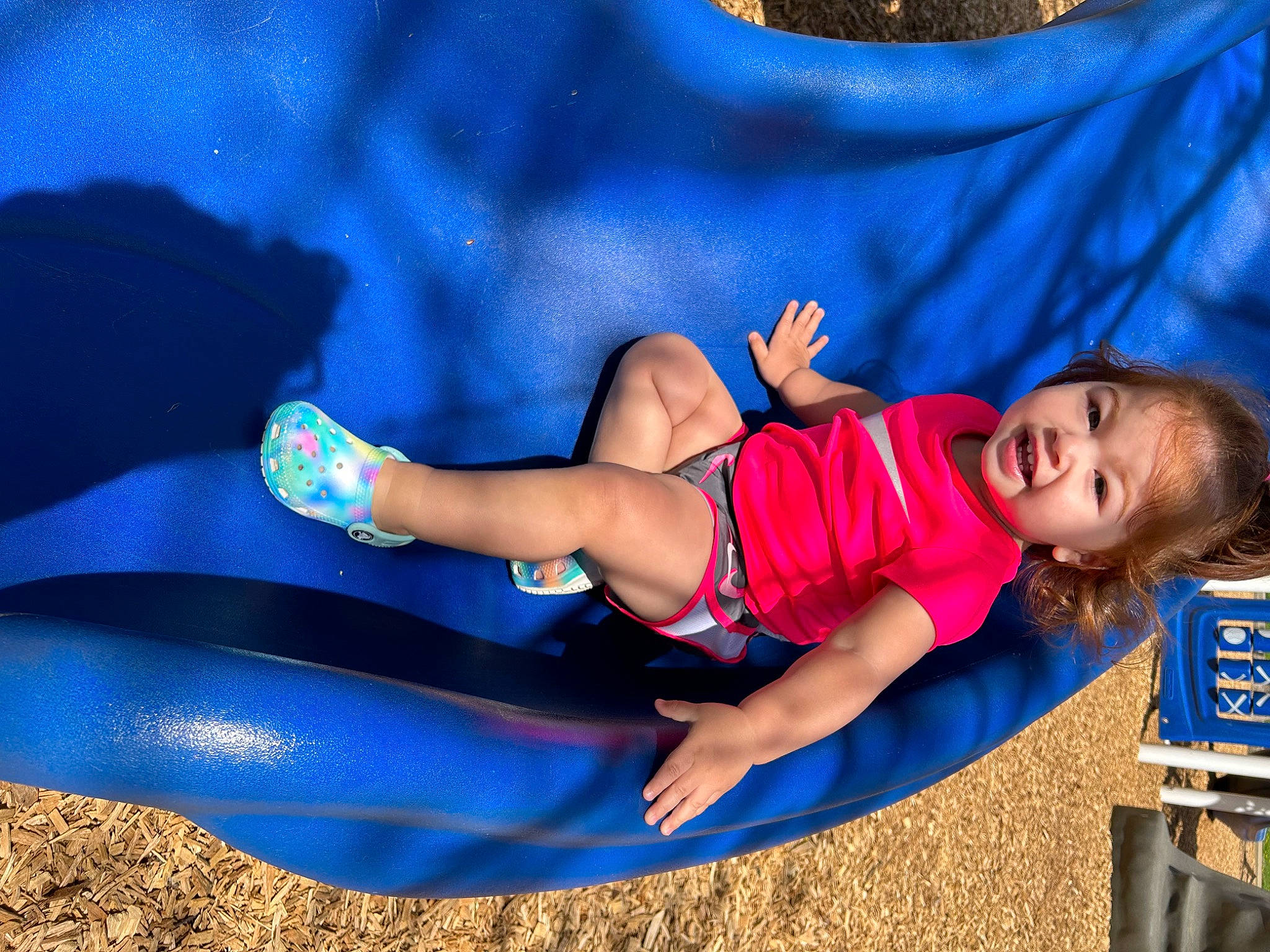 Amiyah joined the competition — help win amazing prizes! child, electric_blue, fun, grass, happy, human_leg, knee, leg, leisure, outdoor_play_equipment, person, play, playground, playground_slide, recreation, sandal, sitting, sneakers, thigh, toddler