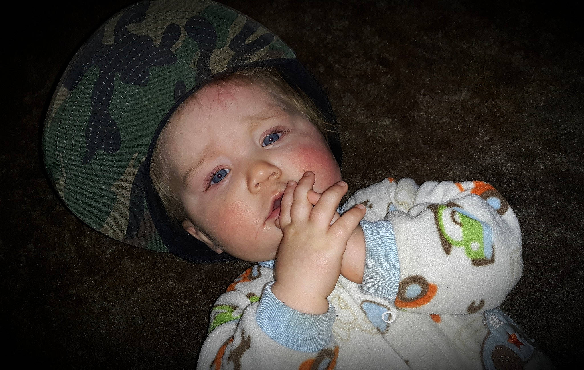 Axton is registered to the contest to win money with this photo: baby, cheek, child, eye, face, head, iris, mouth, nose, person, skin, smile, toddler