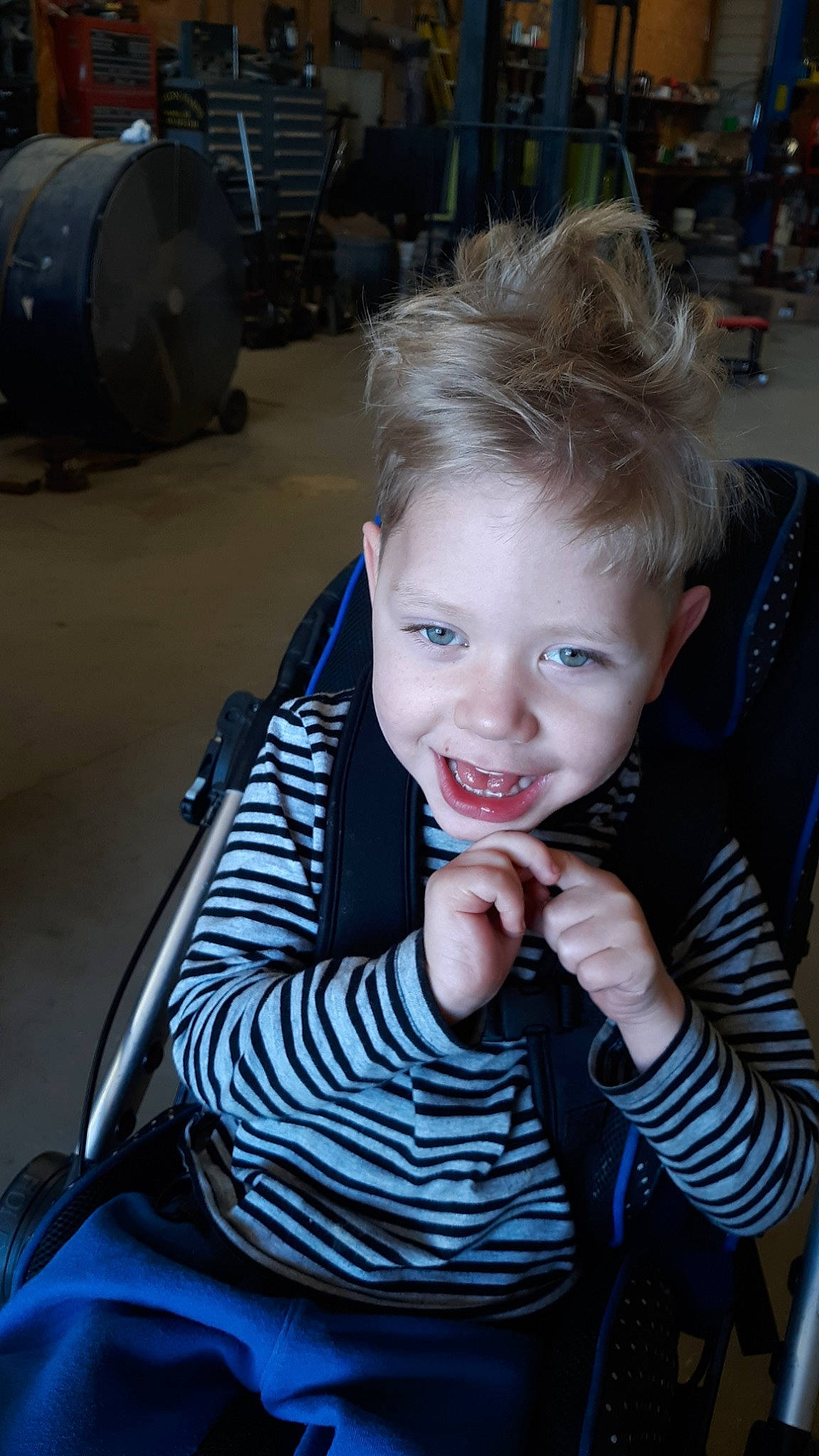 Moses is registered to the contest to win money with this photo: baby, blond, cheek, child, ear, eye, face, facial_expression, finger, fun, gesture, glasses, hair, hairstyle, head, lip, nose, person, smile, toddler