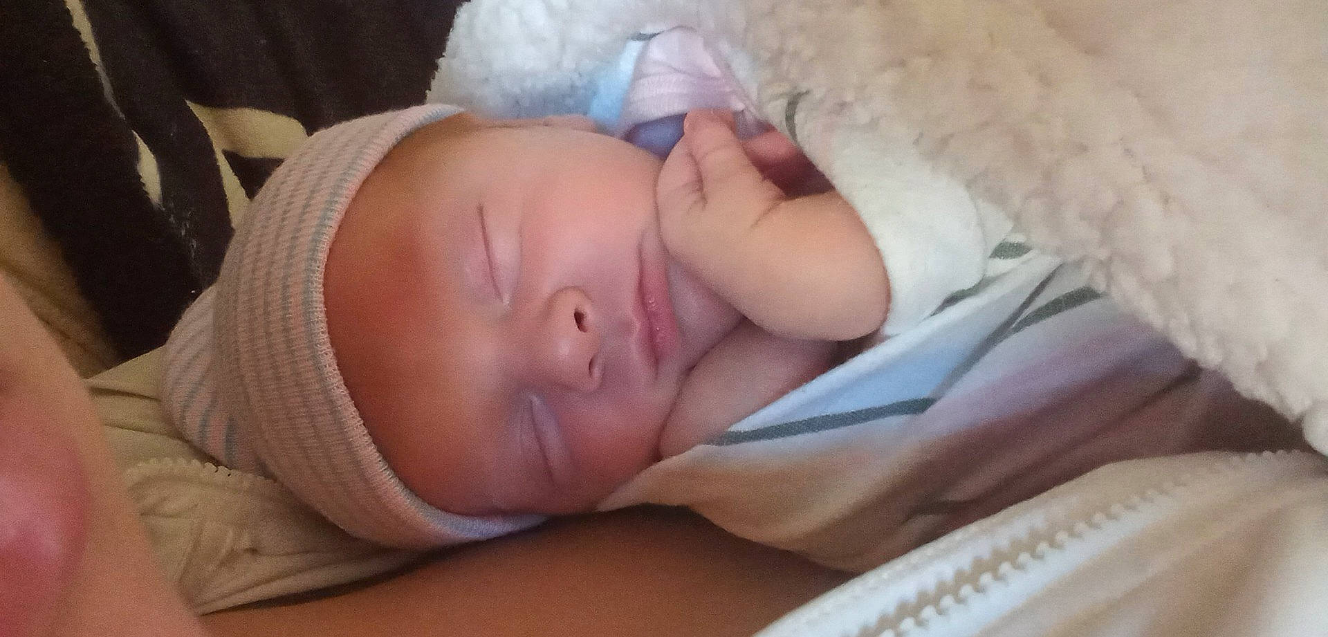 A'Mariana is registered to the contest to win money with this photo: baby, baby_products, baby_sleeping, baby_toddler_clothing, cheek, child, comfort, eyelash, finger, hat, headgear, iris, lip, mouth, nap, nose, person, skin, sleep, thumb