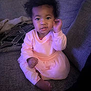 Cambrya joined the competition — help win amazing prizes! toddler, child, pink_dress, curly_hair, couch, indoor, portrait, sitting, cozy, expression, furniture, young_child, casual, home, person, cute, baby, face, hand, looking